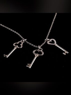 Excellent Condition Tiffany & Co. Silver Key Trio Pendant Necklace